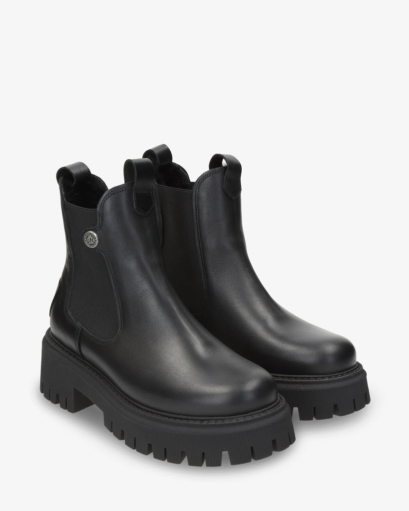 Cyntia Igloo botas de piel con forro interior de pelo natural. negro