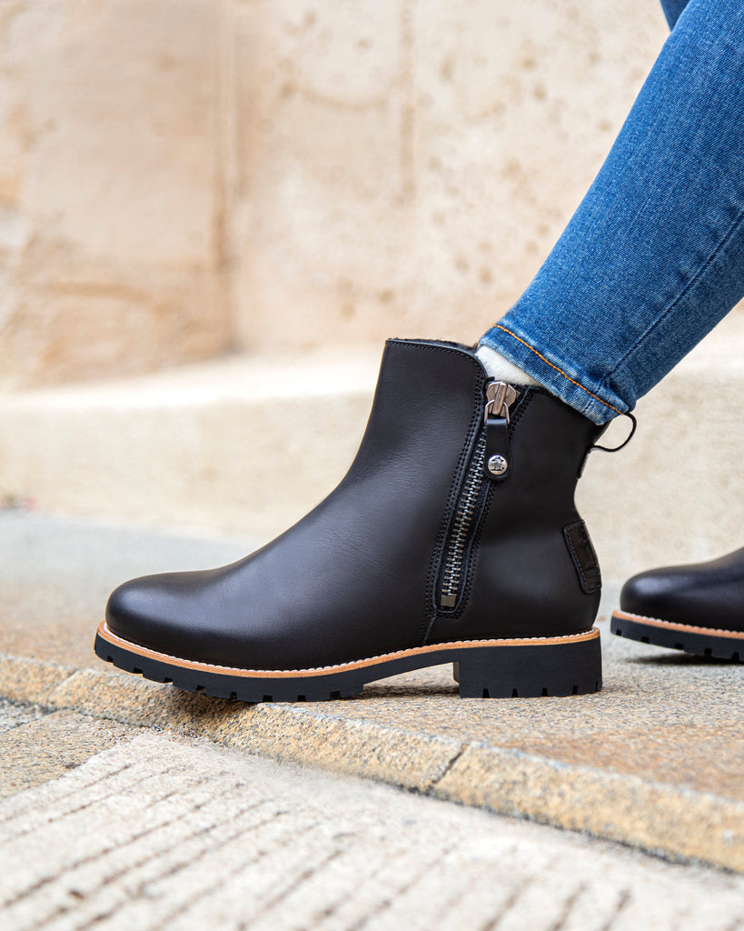 Fiore Trav botas de piel con forro interior de pelo. negro