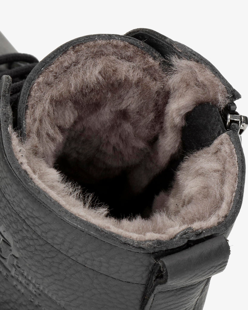 German Igloo botín de piel con forro interior de pelo natural. negro