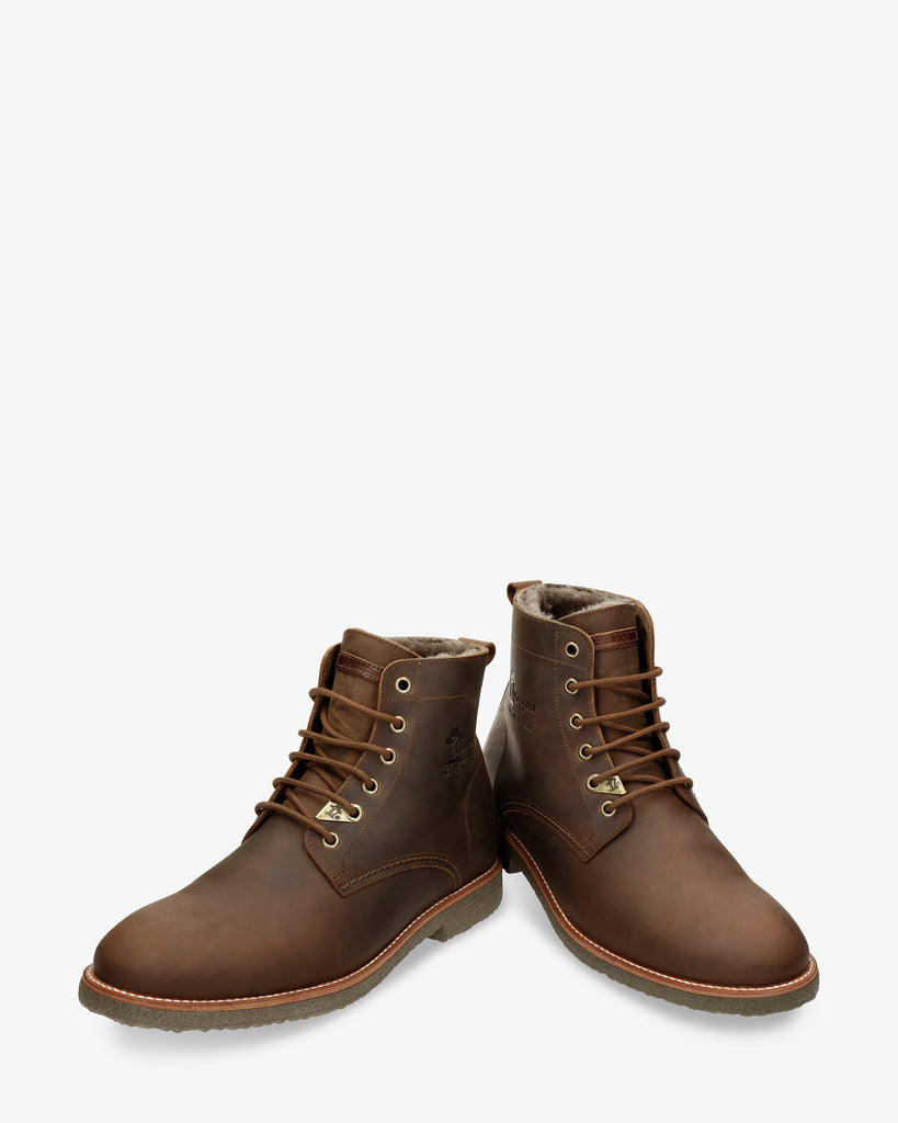 Glasgow Igloo botines de piel con forro interior de pelo natural. cuero