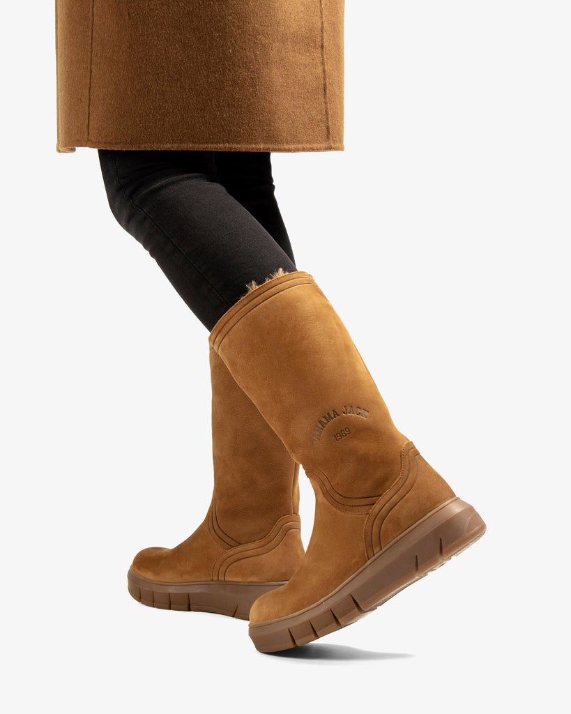 Neck botas de piel con forro interior de pelo. cuero