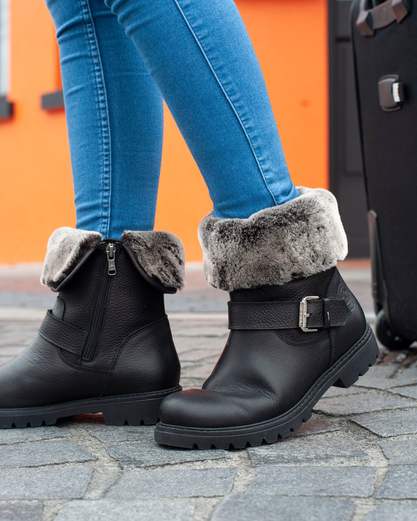 Singapur botas de piel con forro interior de pelo. negro